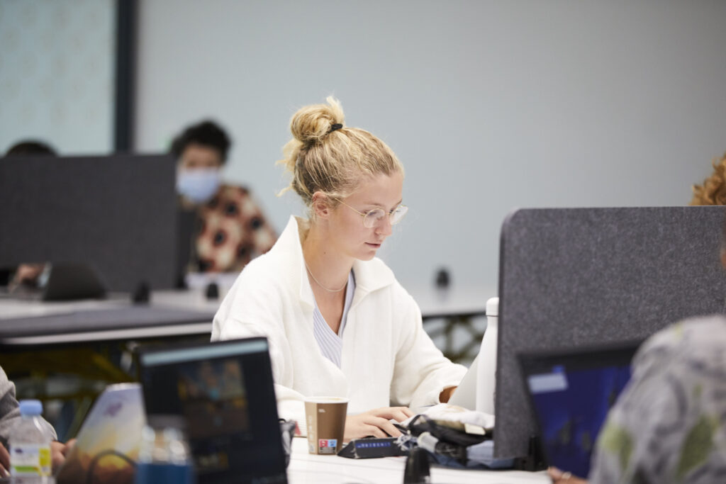 Student working with a laptop