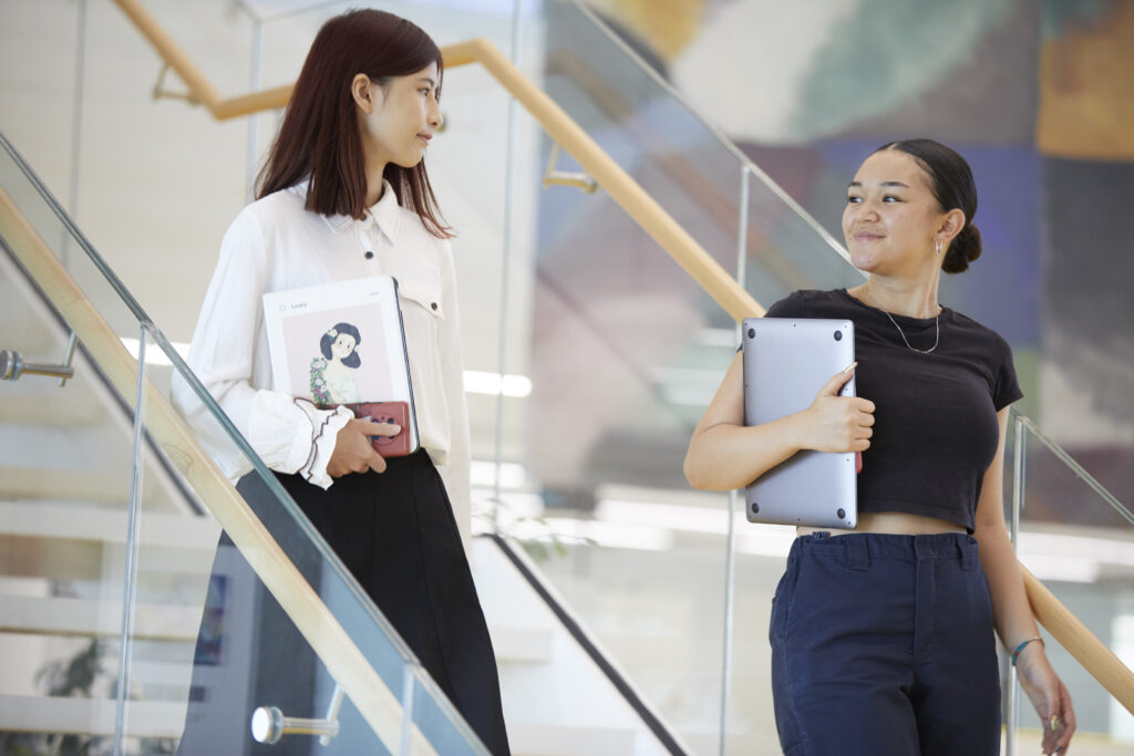 Students going down stairs