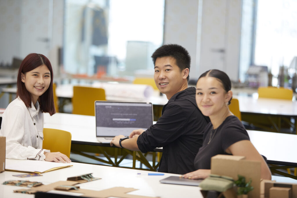 Students working with their laptops