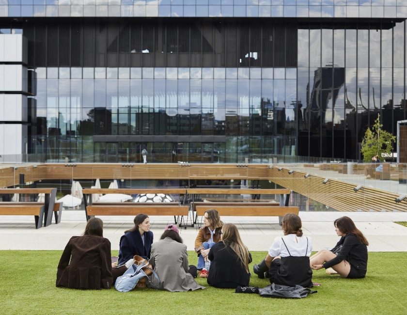 Students sitting on grass