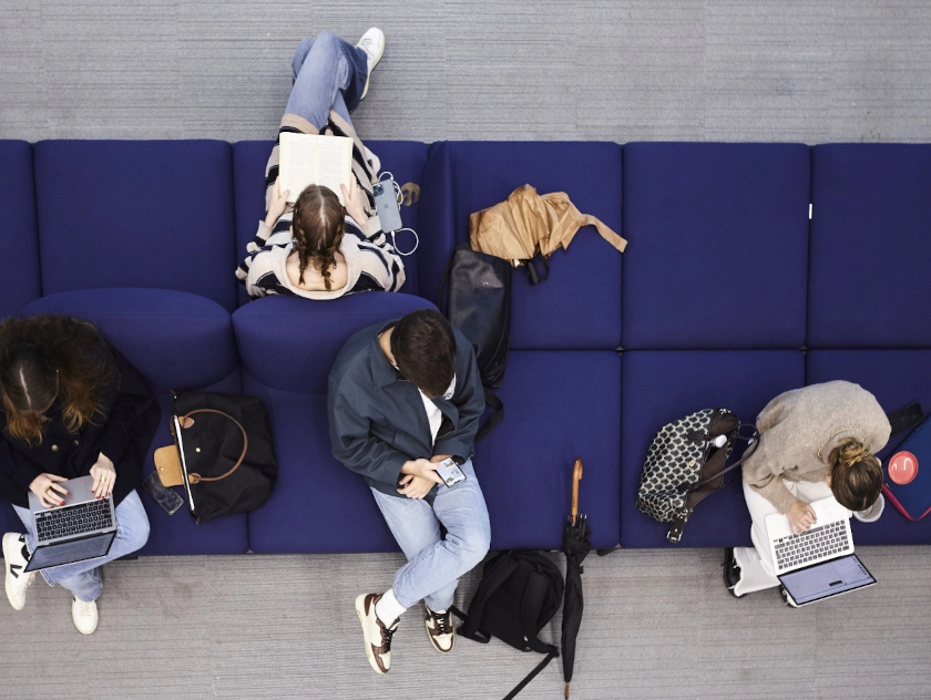 Students sitting on a couch