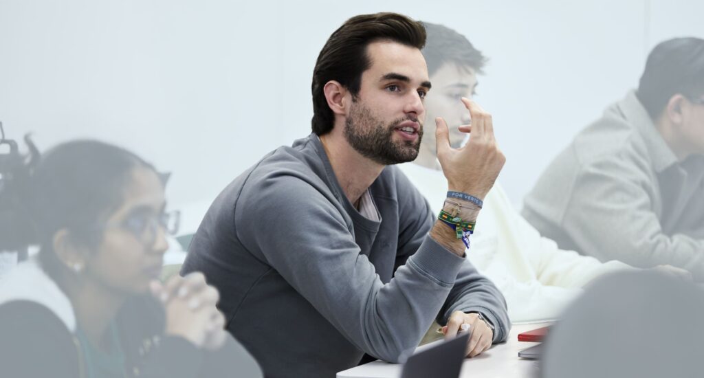 Student discussing Master in Management careers at IE Business School