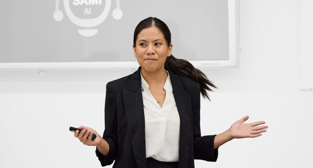 A woman demonstrates personal branding for students in a presentation